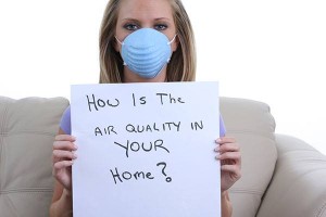 Indoor air quality woman with mask and sign